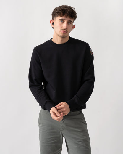 studio shot of a model wearing a Parajumpers K2 Crew Neck Mens Sweatshirt in Black 541