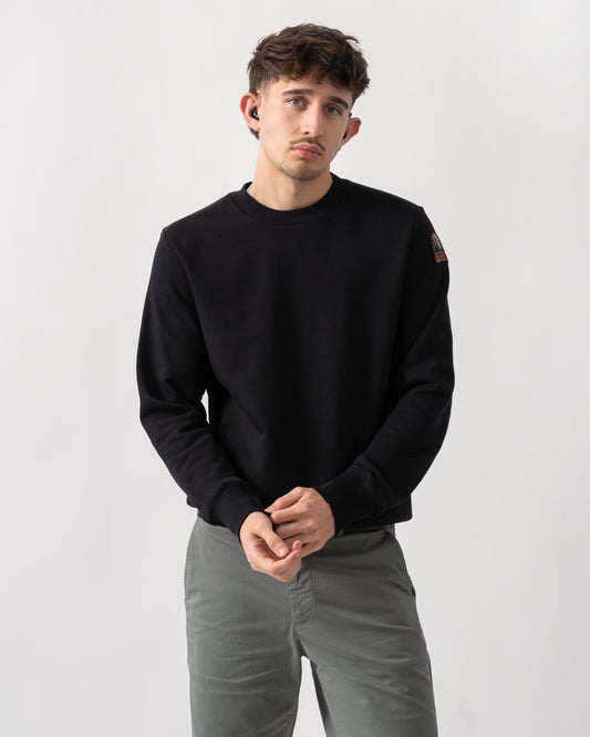 studio shot of a model wearing a Parajumpers K2 Crew Neck Mens Sweatshirt in Black 541