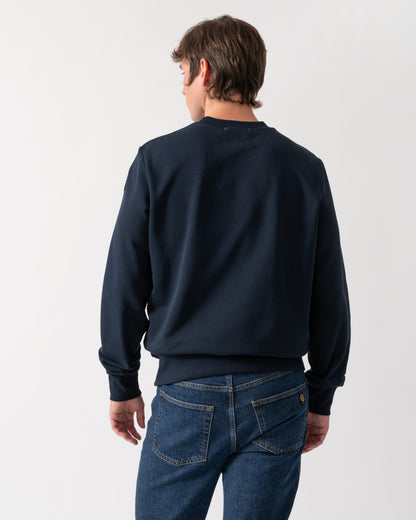back shot of a model wearing a Parajumpers K2 Crew Neck Mens Sweatshirt in Blue Navy 316