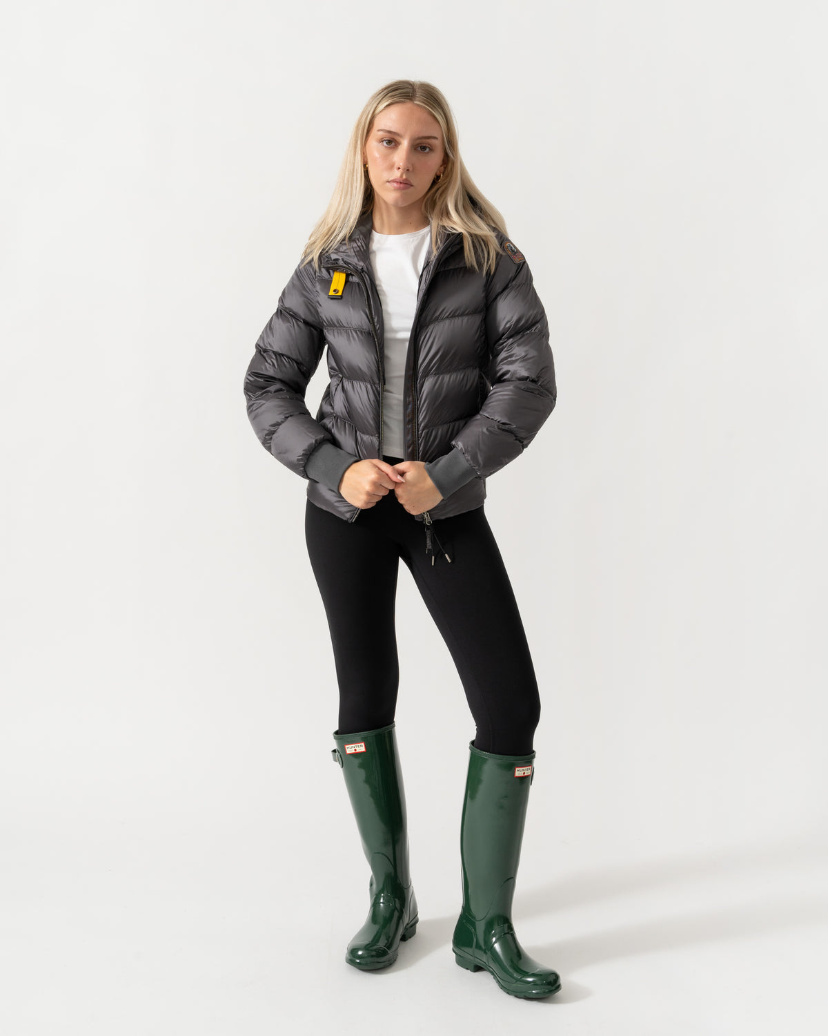 Model wearing the Parajumpers Mariah Womens Hooded Down Bomber Jacket - Graphite Orchid 124