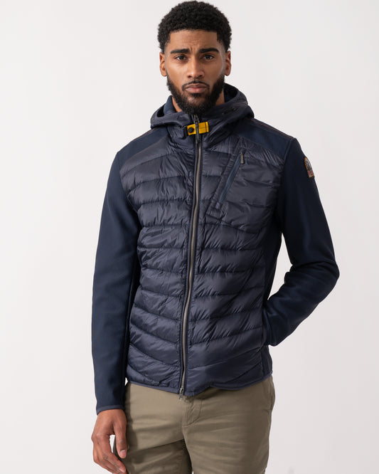 model wearing a Parajumpers Nolan Mens Fleece/Nylon Hooded Jacket in Blue Navy