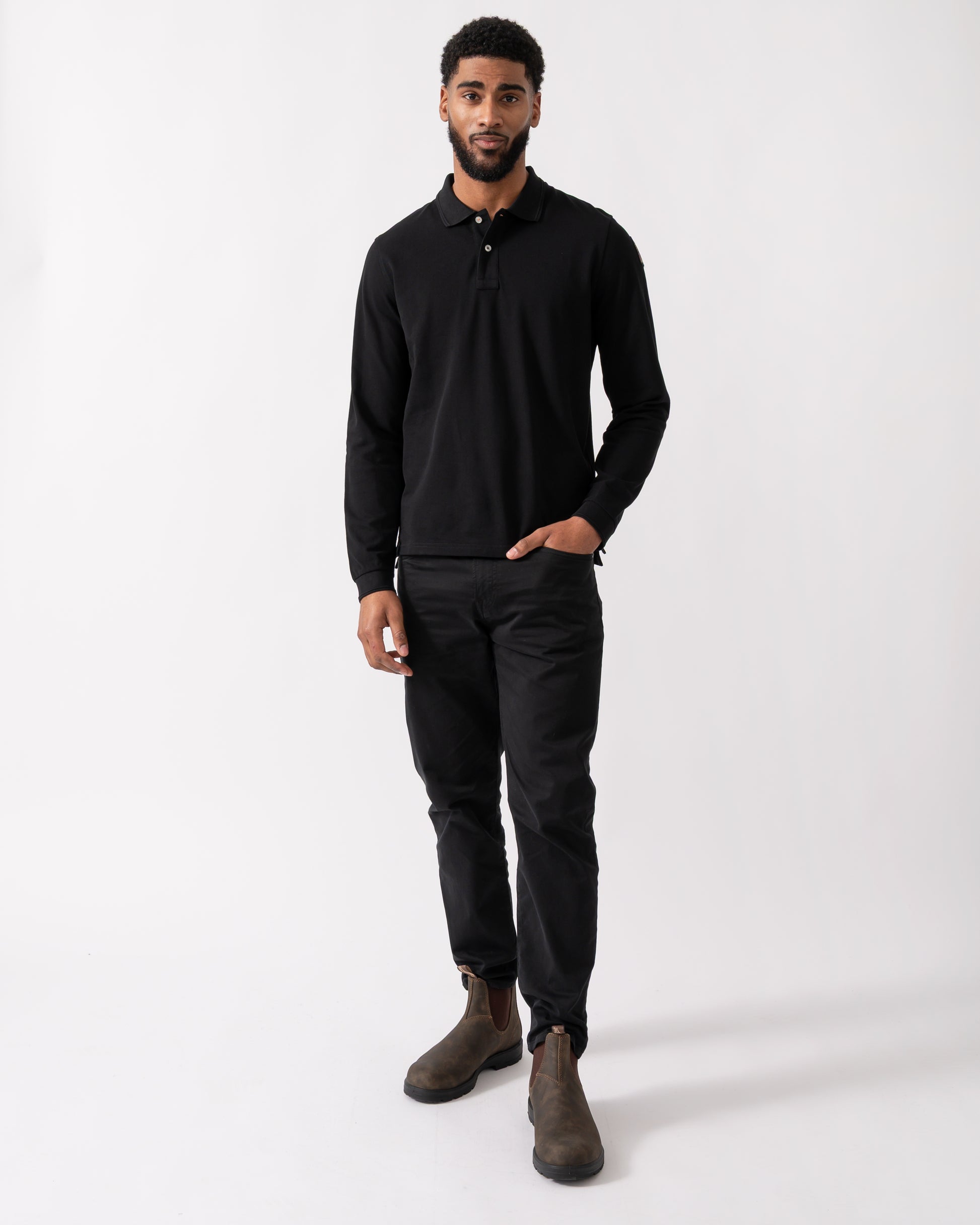 Full length shot of a Model wearing a Parajumpers Oberon Polo Mens Polo in Black