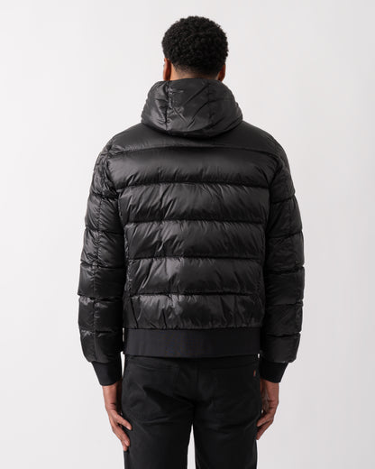 back shot of a model wearing a Parajumpers Pharrell Mens Hooded Down Bomber in Black