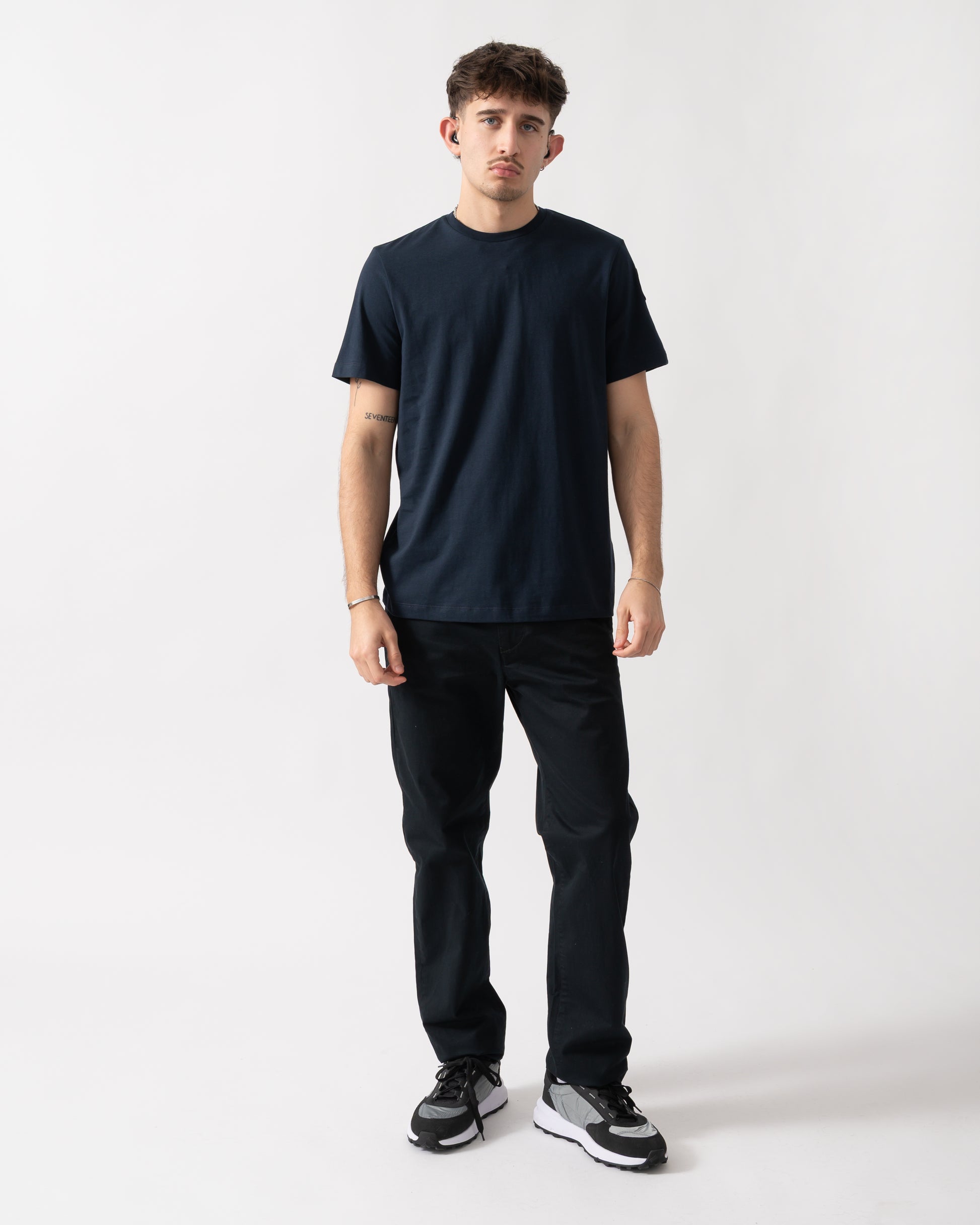 full length shot of a model wearing a Parajumpers Shispare Mens T-Shirt in Blue Navy 316