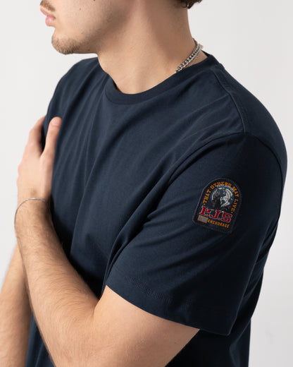 detail shot of a model wearing a Parajumpers Shispare Mens T-Shirt in Blue Navy 316