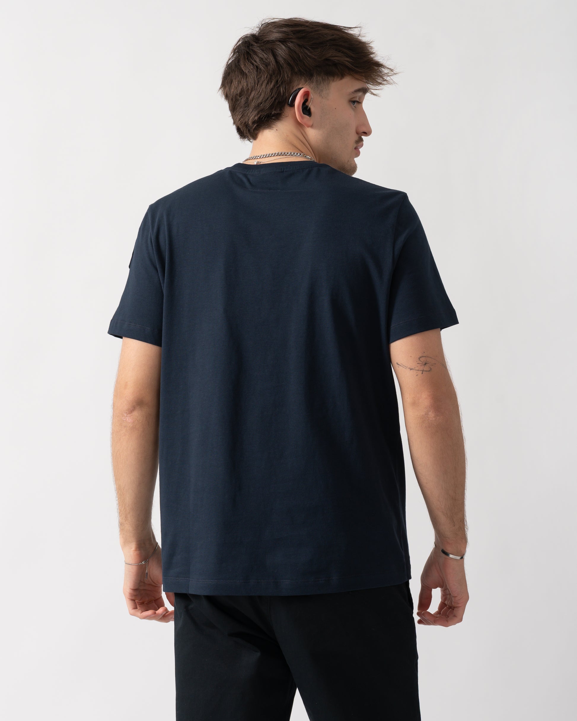 back shot of a model wearing a Parajumpers Shispare Mens T-Shirt in Blue Navy 316