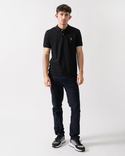 full length shot of a model wearing a Parajumpers Wellington Mens Polo Shirt in Black 541