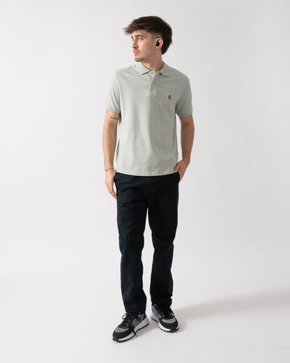 full length shot of a model wearing a Parajumpers Wellington Mens Polo Shirt in Fresh Grey 271