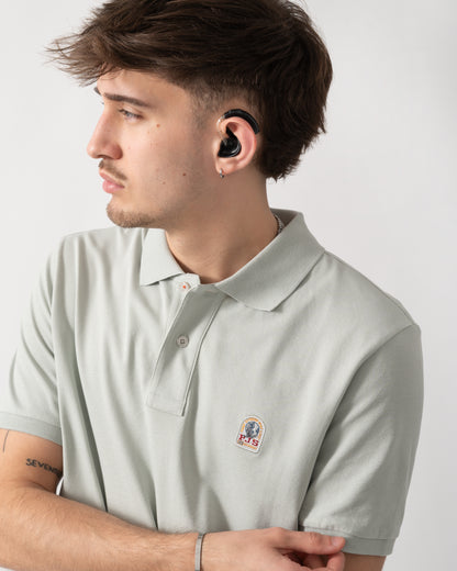 close up shot of a model wearing a Parajumpers Wellington Mens Polo Shirt in Fresh Grey 271