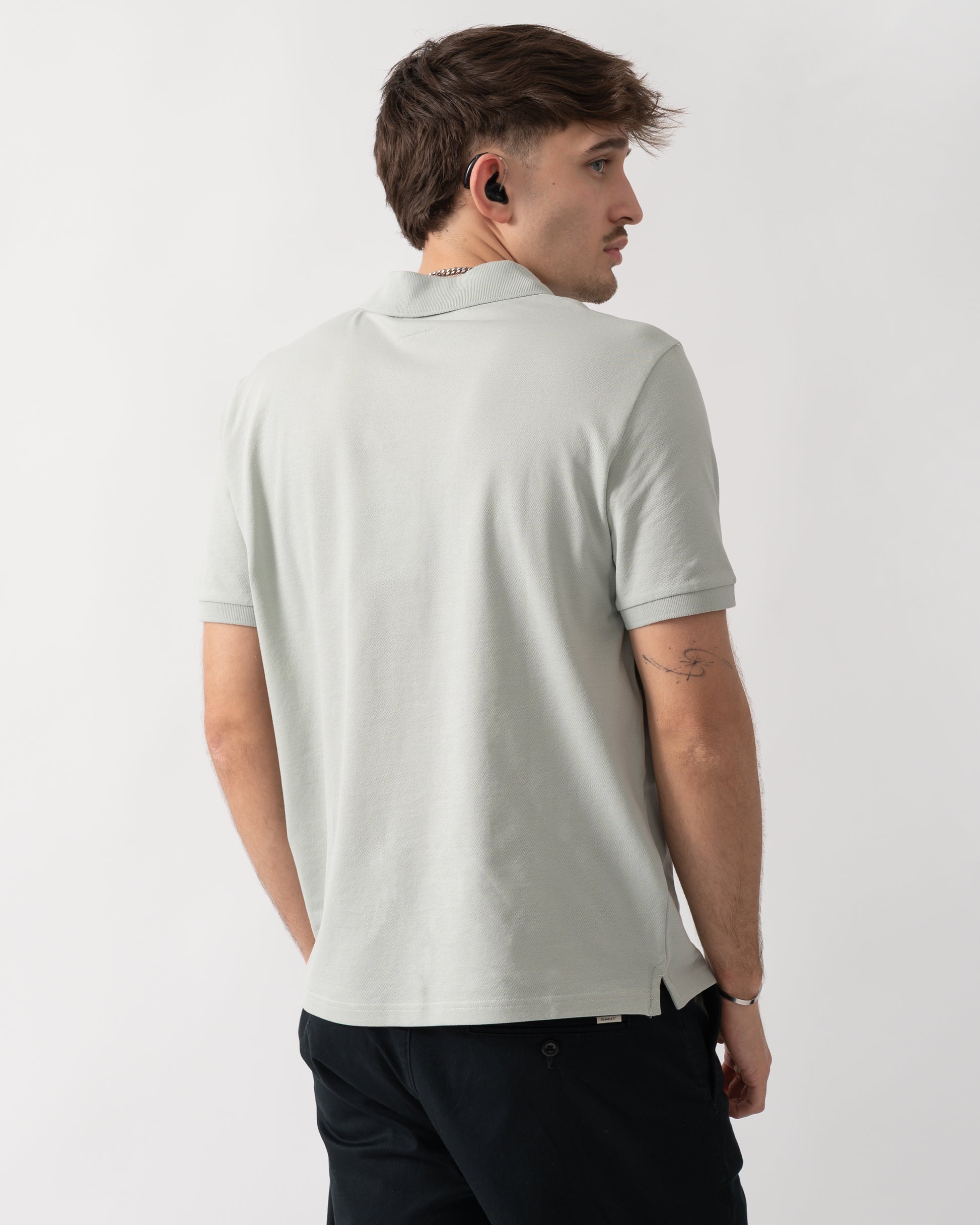 back shot of a model wearing a Parajumpers Wellington Mens Polo Shirt in Fresh Grey 271