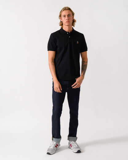 full length of a model wearing Parajumpers Wellington Mens Short Sleeve Polo in Black 541