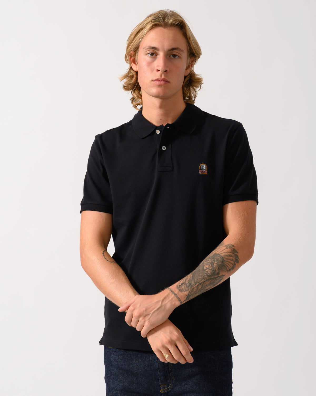 model wearing Parajumpers Wellington Mens Short Sleeve Polo in Black 541