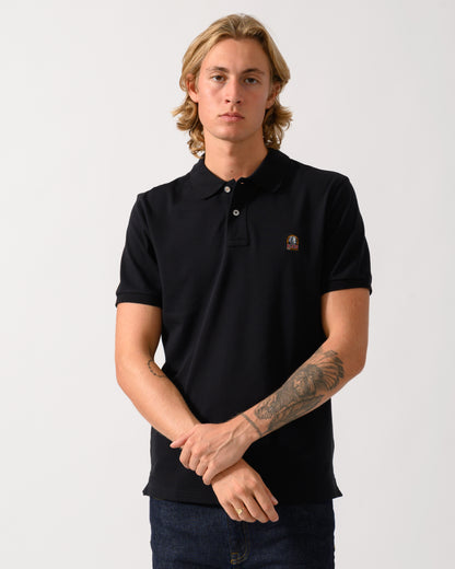 model wearing Parajumpers Wellington Mens Short Sleeve Polo in Black 541