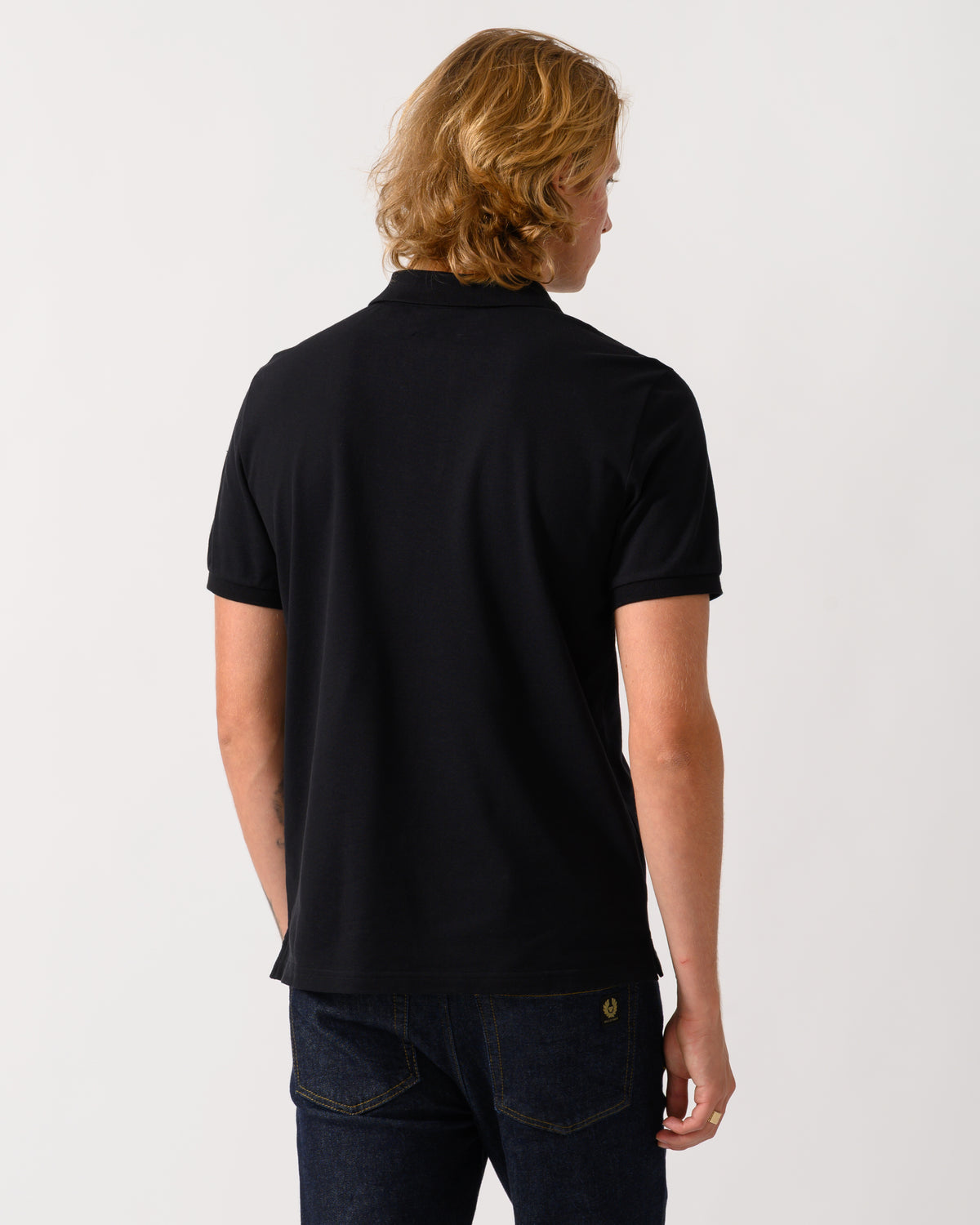 back of a model wearing Parajumpers Wellington Mens Short Sleeve Polo in Black 541