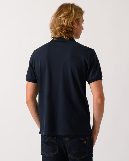 back of a model wearing a Parajumpers Wellington Mens Short Sleeve Polo in Blue Navy 316