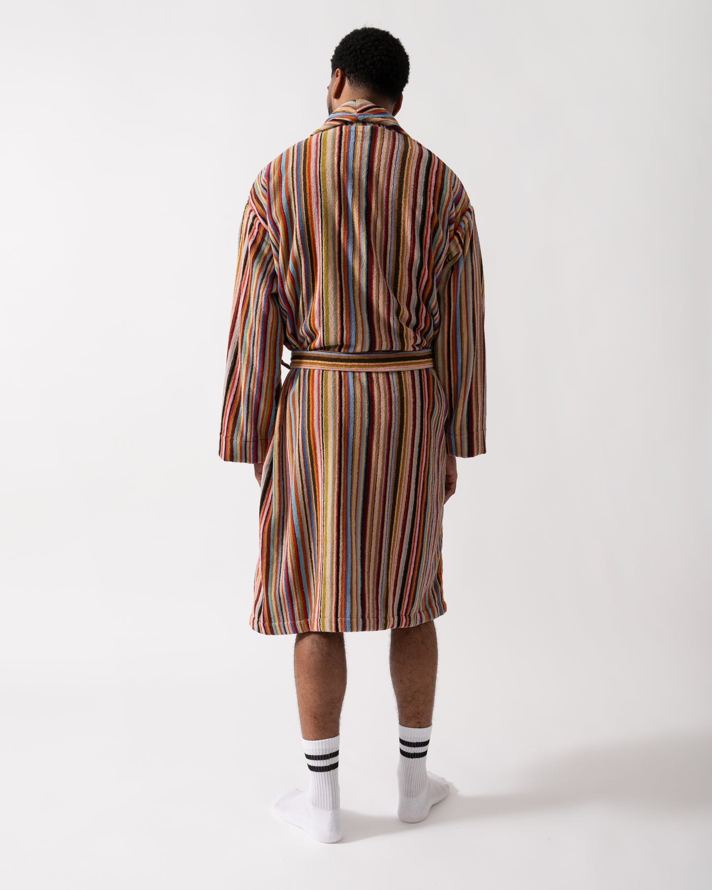 Back shot of a Model wearing a Paul Smith Mens Signature Stripe Dressing Gown in Multicolour