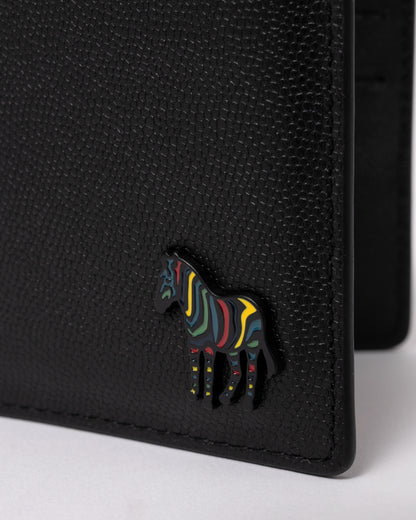 studio photograph showing logo detail of a Paul Smith Mens Zebra Badge Billfold Wallet in 79 Black