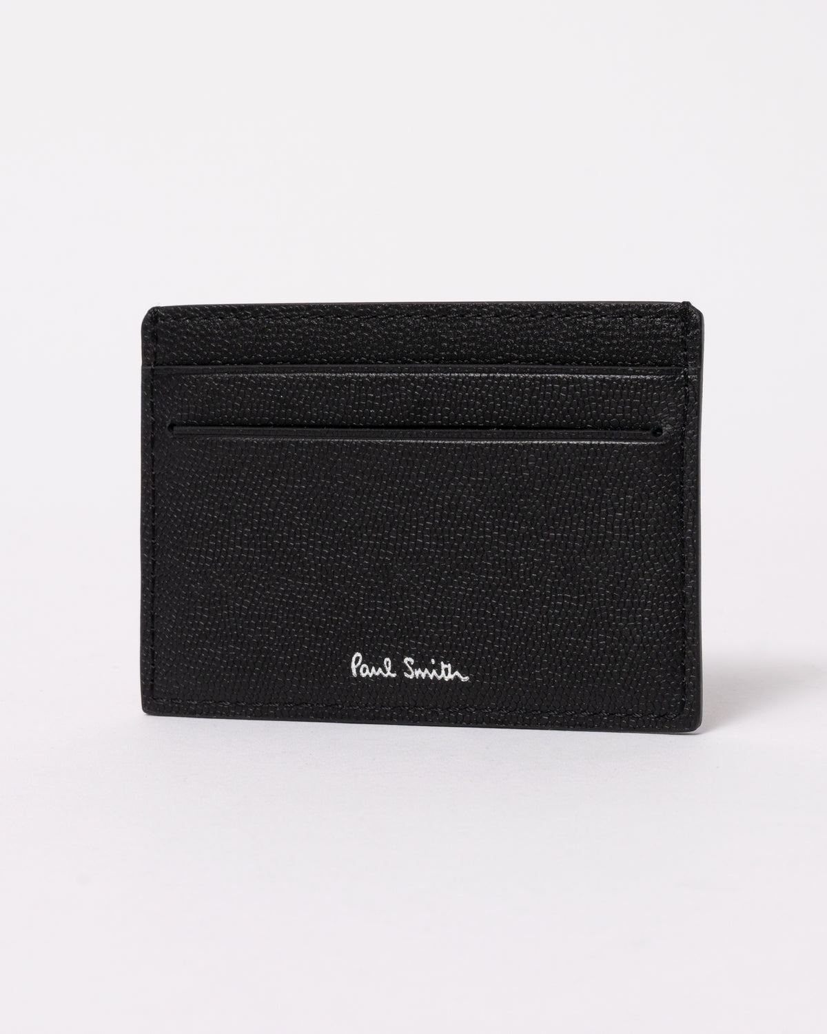 studio photograph showing a Paul Smith Mens Zebra Badge Card Holder in 79 Black