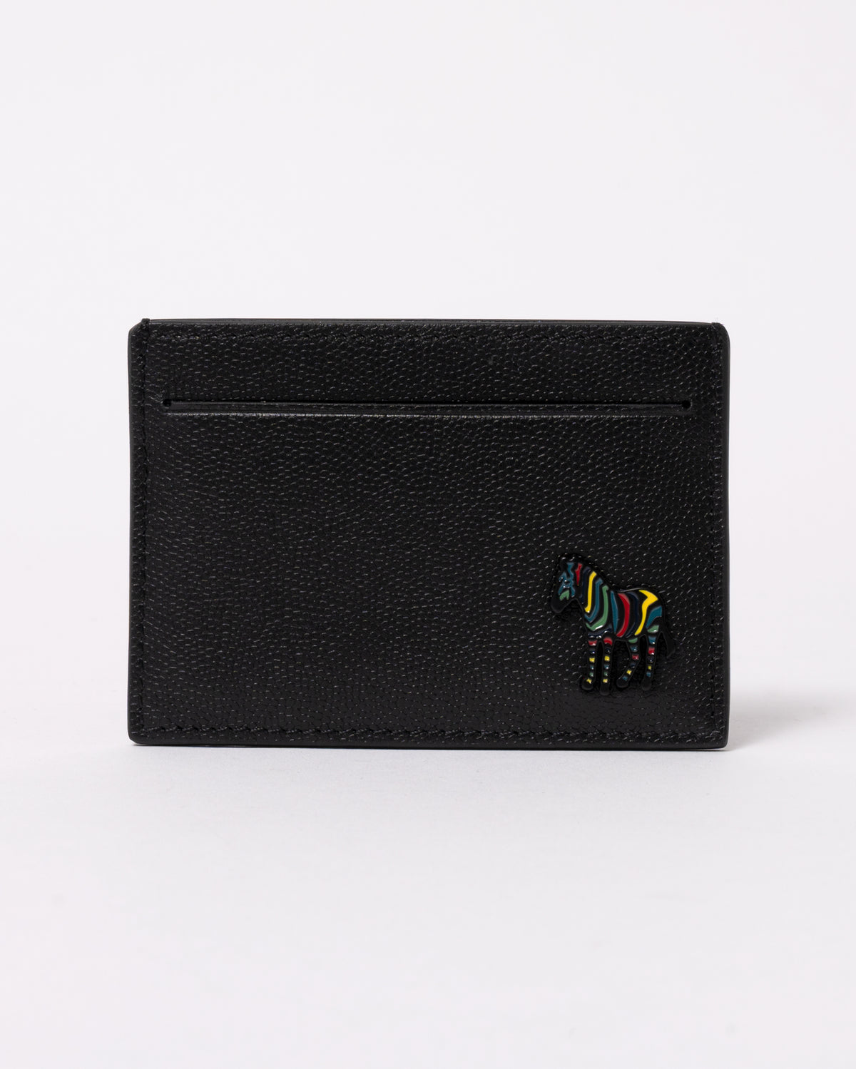 studio photograph showing the front detail of a Paul Smith Mens Zebra Badge Card Holder in 79 Black