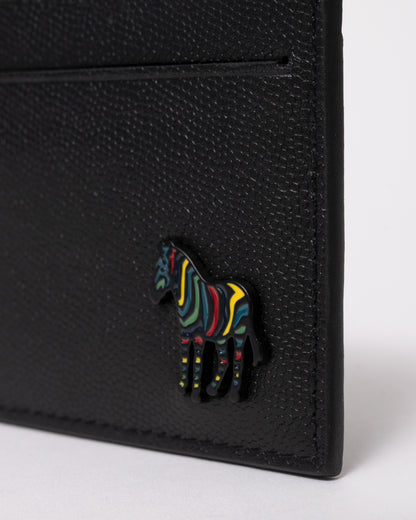 studio photograph showing the logo detail of a Paul Smith Mens Zebra Badge Card Holder in 79 Black