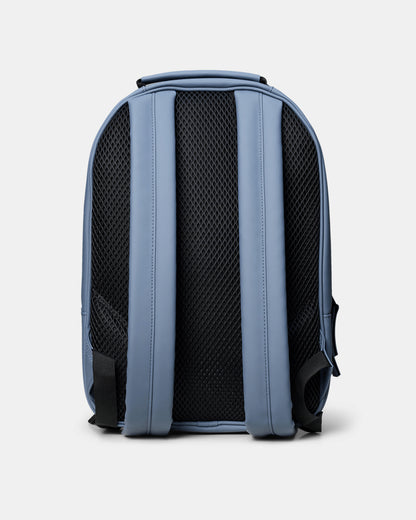 back shot of Rains Book Daypack in 172 Blue Dusk