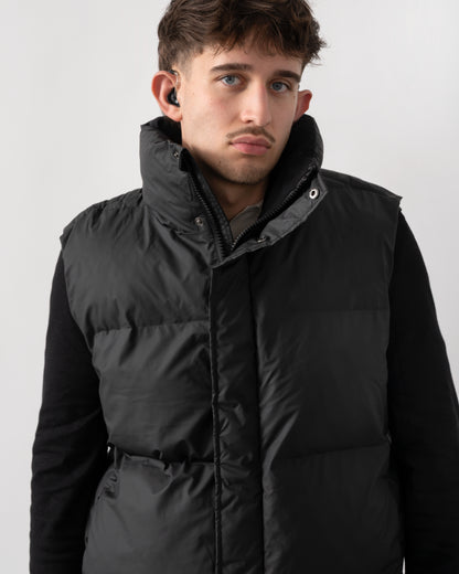 close up of model wearing a Rains Boxy Unisex Puffer Vest