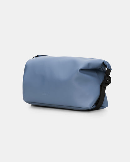 side of a Rains Hilo Wash Bag in 172 Blue Dusk