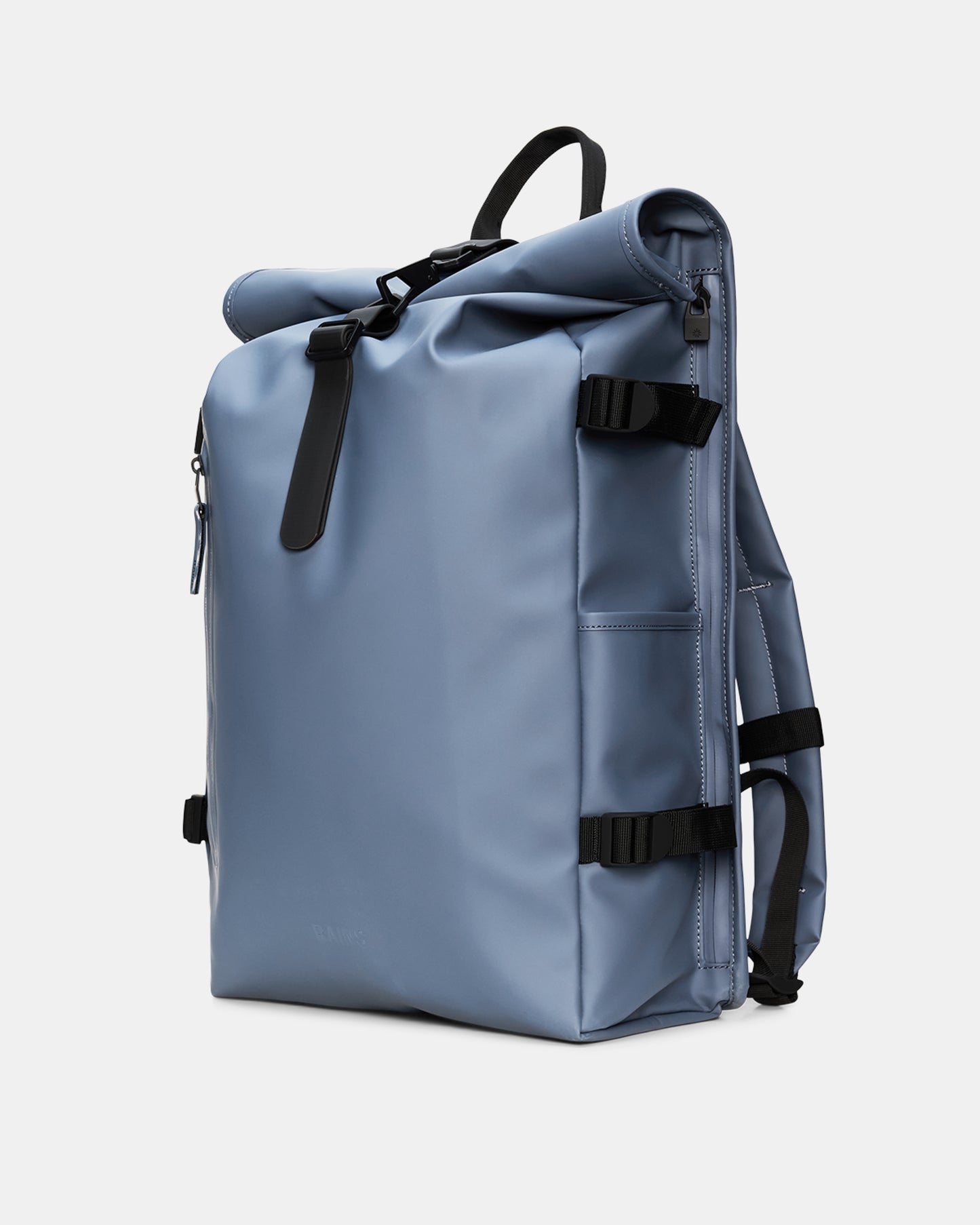 side of a Rains Rolltop Rucksack Large in 172 Blue Dusk