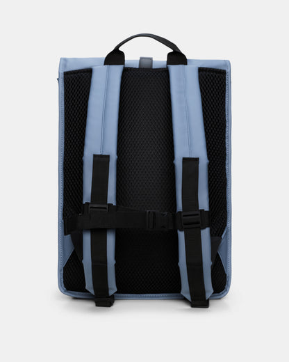 back of a Rains Unisex Rolltop Rucksack in 172 Blue Dusk