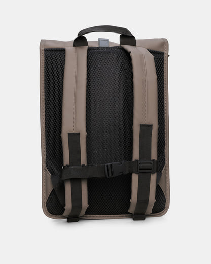 back of a Rains Unisex Rolltop Rucksack in 173 Cinder