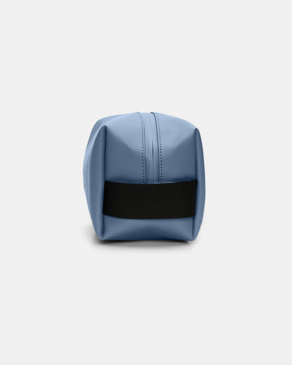 side of a Rains Wash Bag Small in 172 Blue Dusk