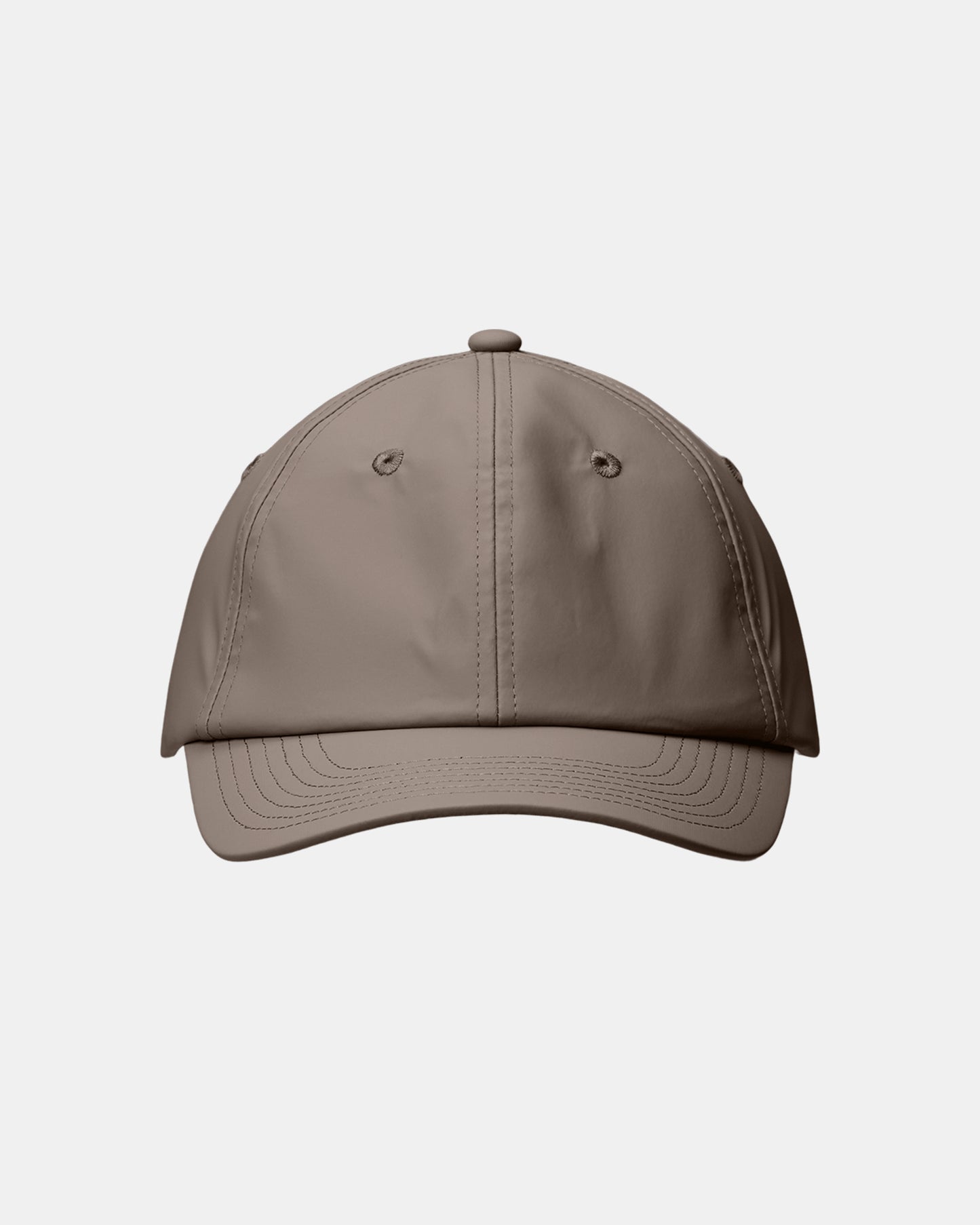 front of a Rains Waterproof Six Panel Cap in 173 Cinder