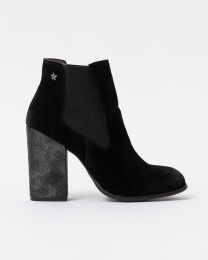 Black ankle boot with a block heel on a white background
