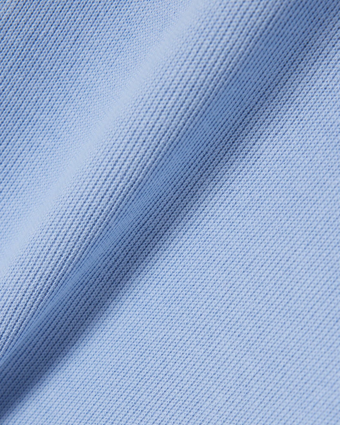 Flat lay of Lacoste Zippered Stand-Up Collar Cotton Sweatshirt in Aphylla AEY - Fabric Detail