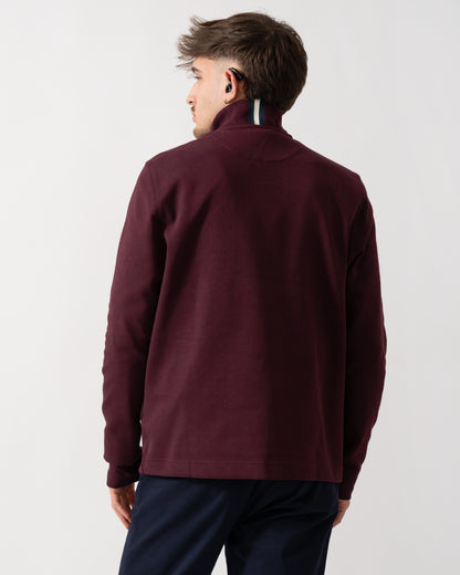 back shot of a Model wearing a Ted Baker Actos Mens 1/4 Zip Sweatshirt in Maroon