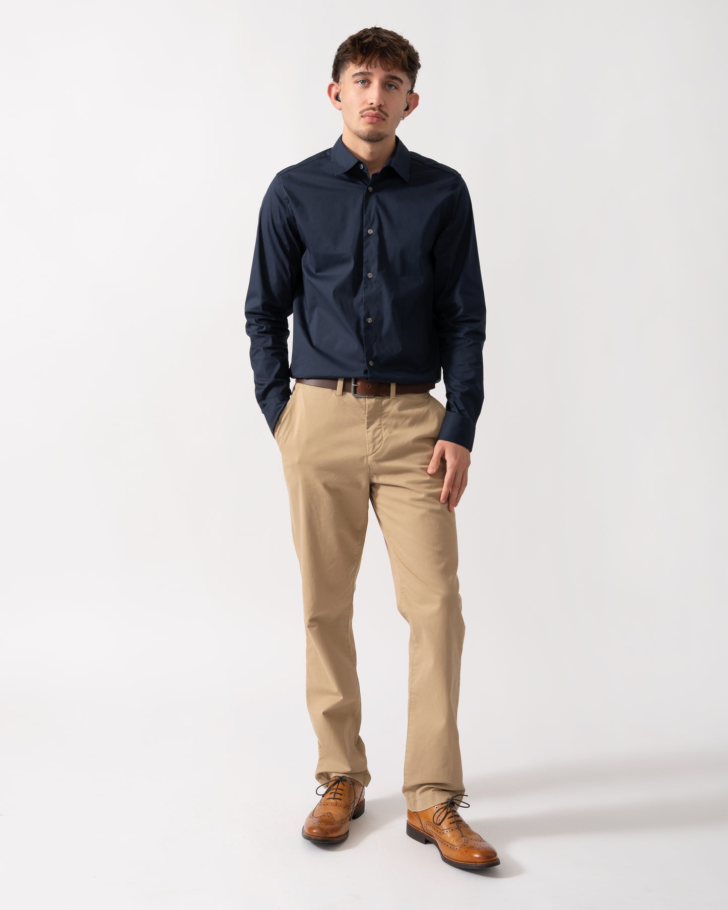 Full length shot of a Model wearing a Ted Baker Baxters Mens Long Sleeve Slim Stretch Shirt in Navy
