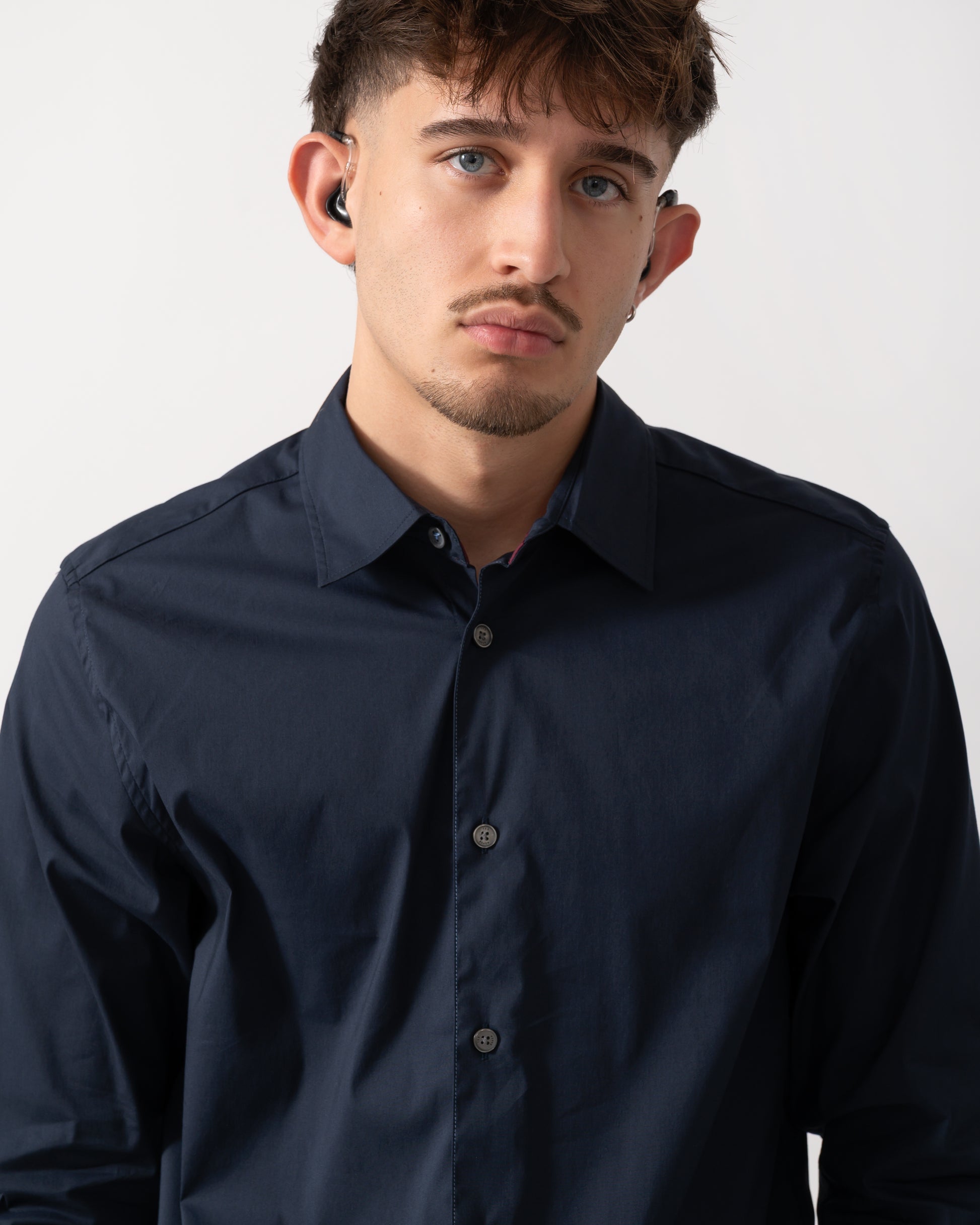 Detail shot of a Model wearing a Ted Baker Baxters Mens Long Sleeve Slim Stretch Shirt in Navy