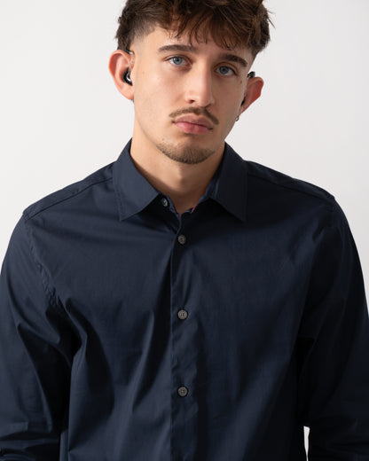 Detail shot of a Model wearing a Ted Baker Baxters Mens Long Sleeve Slim Stretch Shirt in Navy