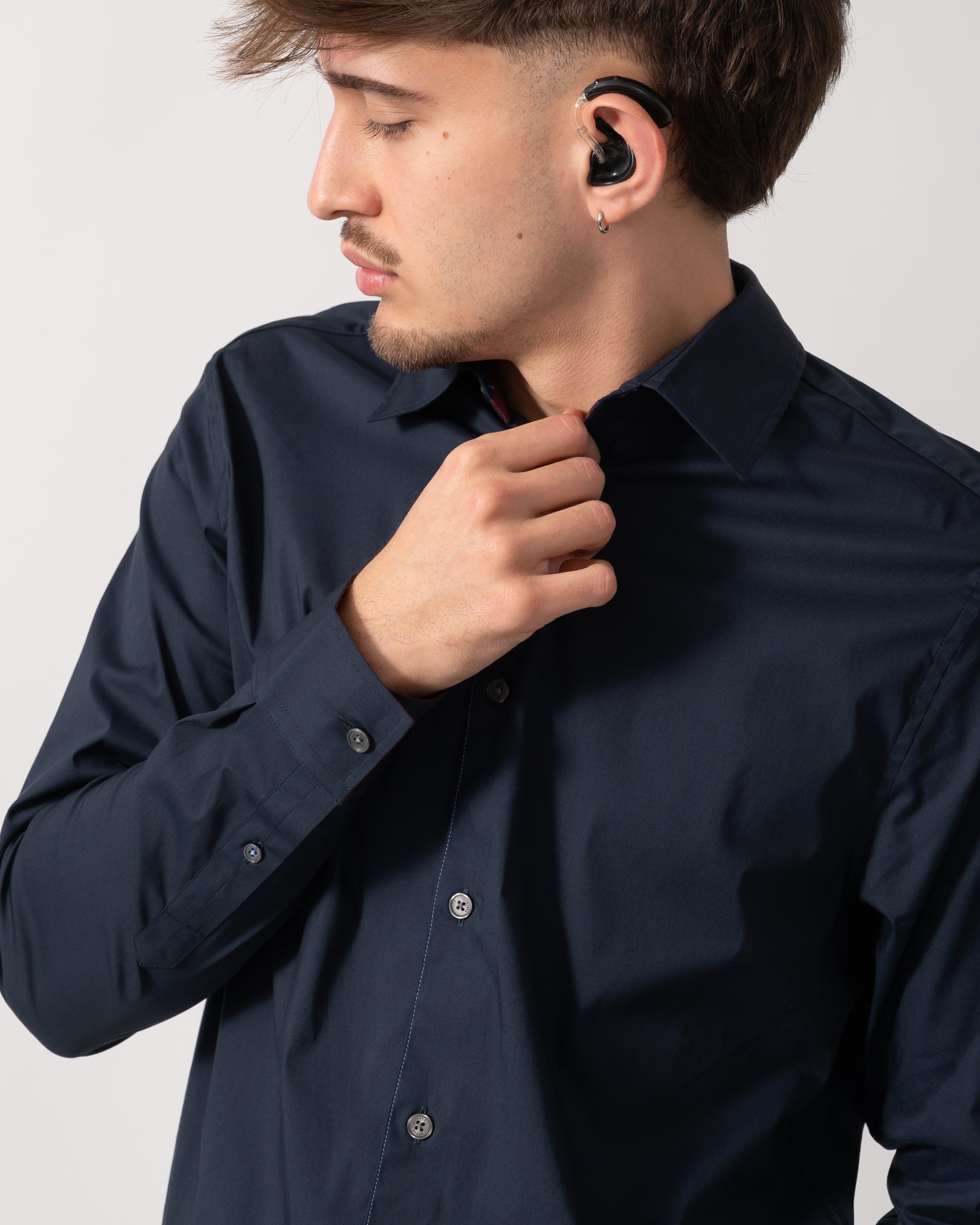 Close up shot of a Model wearing a Ted Baker Baxters Mens Long Sleeve Slim Stretch Shirt in Navy