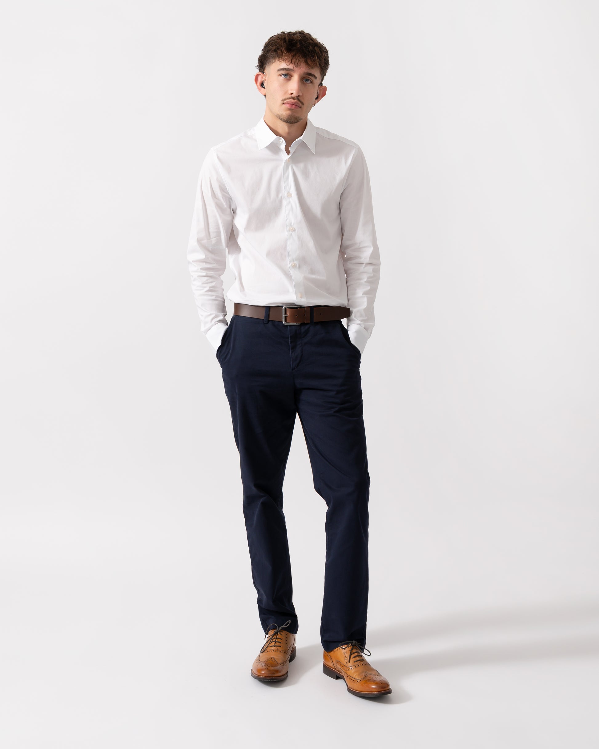 Full length shot of a Model wearing a Ted Baker Baxters Mens Long Sleeve Slim Stretch Shirt in White
