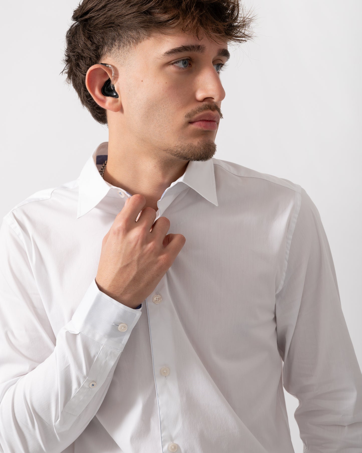 Close up of a Model wearing a Ted Baker Baxters Mens Long Sleeve Slim Stretch Shirt in White