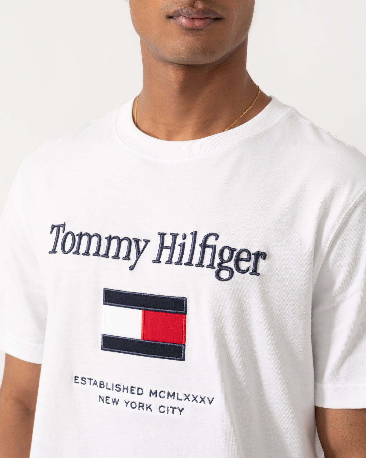 Close up of the Tommy Hilfiger Embroidery Hilfiger Flag T-Shirt - White