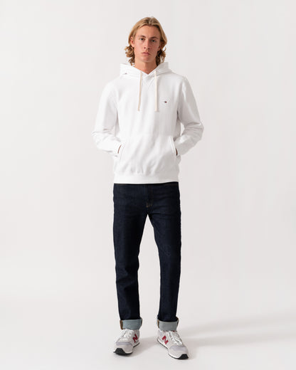 Man wearing the Tommy Hilfiger Essential Fleece Mens Hoodie - White