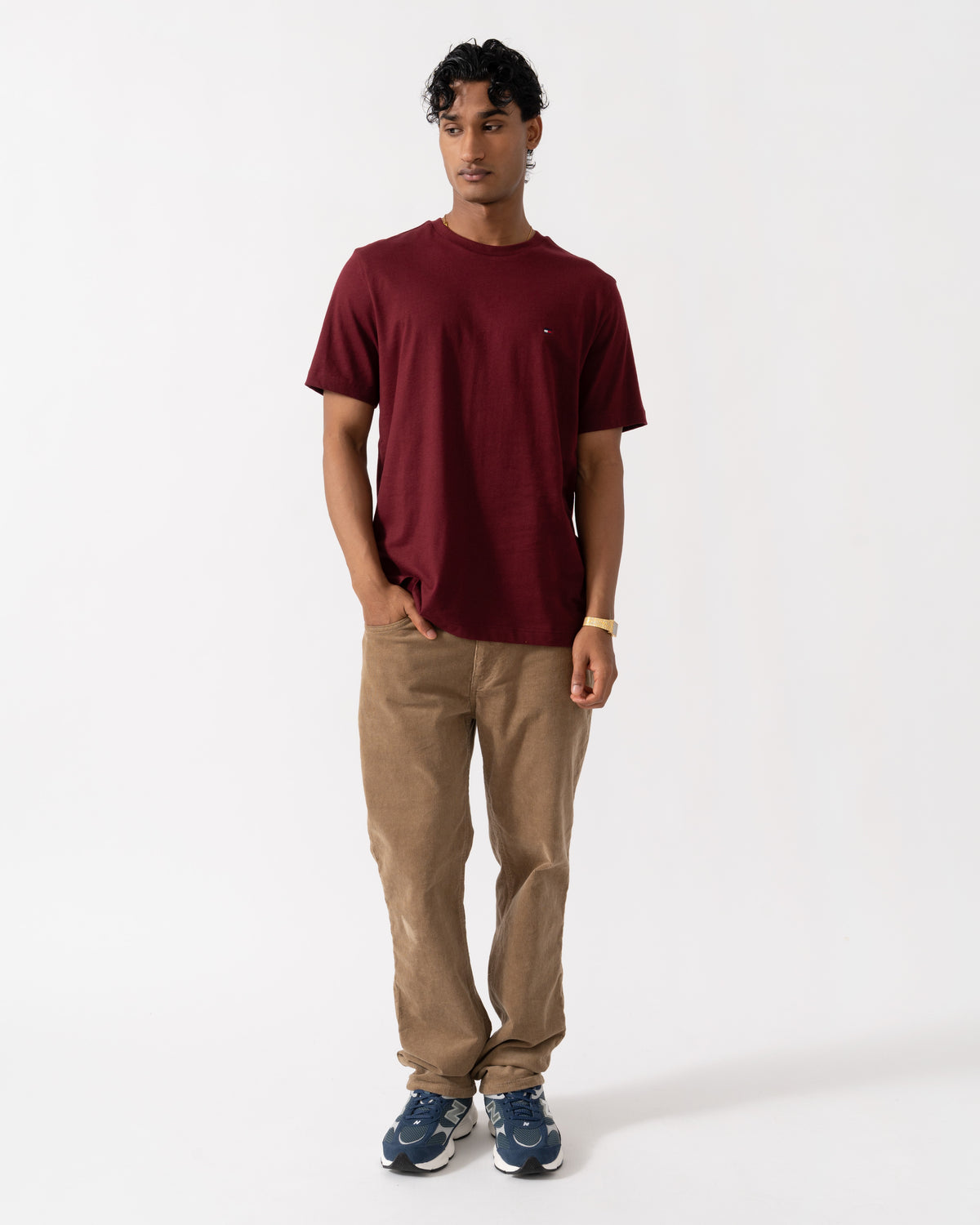 Man wearing the Tommy Hilfiger Essential Seasonal Regular Fit Solid Mens T-Shirt - Burgundy