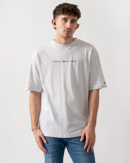 model wearing a Tommy Hilfiger Logo Mens Lounge Tee in Ice Grey Heather