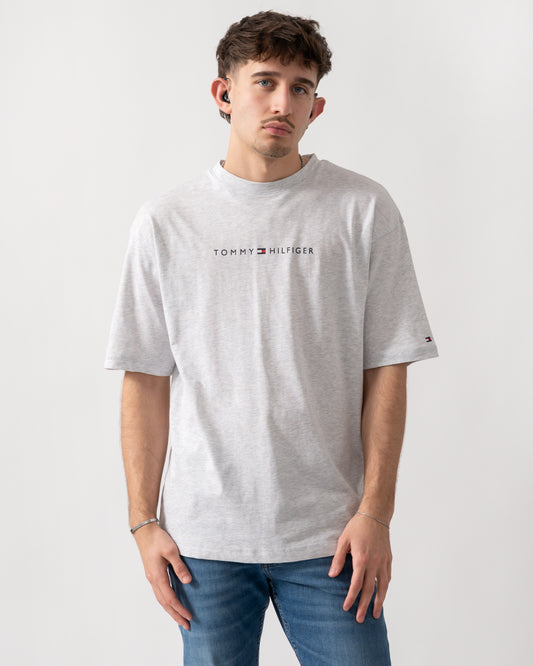 model wearing a Tommy Hilfiger Logo Mens Lounge Tee in Ice Grey Heather