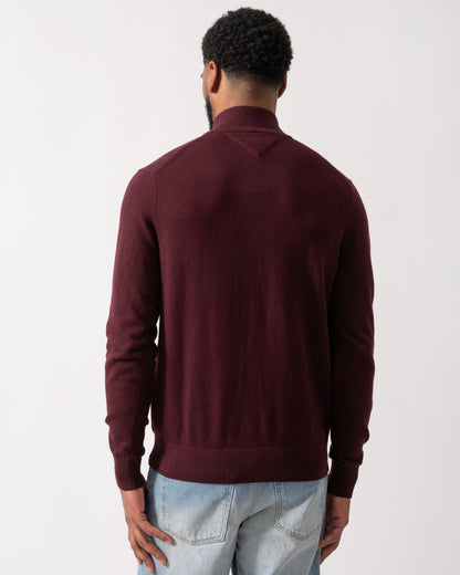 back shot of a model wearing a Tommy Hilfiger Organic Cotton Cashmere Mens Zip-Mock Sweater in Deep Burgundy