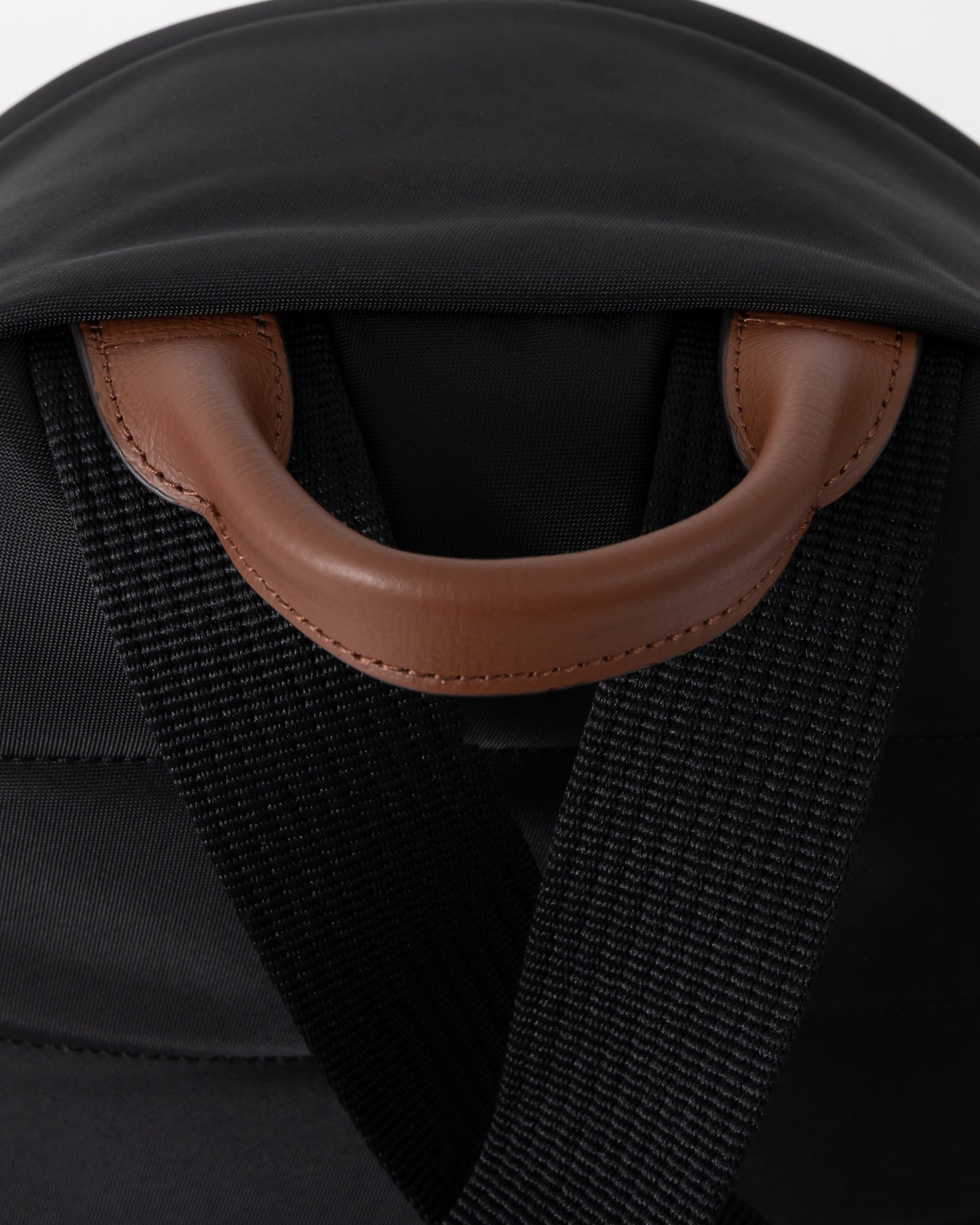 handle of Tommy Hilfiger Popette Dome Womens Backpack in Black
