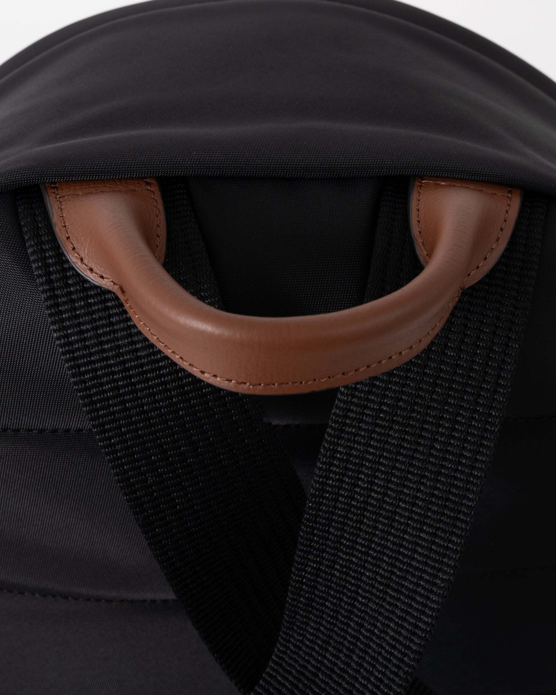 handle of Tommy Hilfiger Popette Dome Womens Backpack in Black