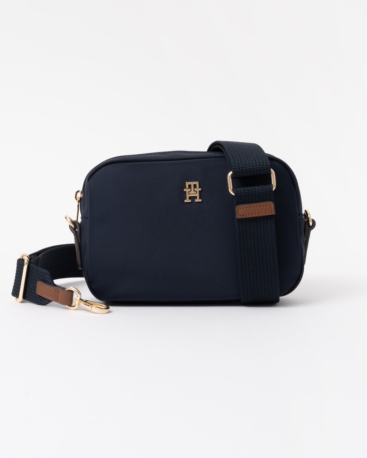 The bag with the strap detatched on the Tommy Hilfiger Popette Womens Camera Bag - Space Blue
